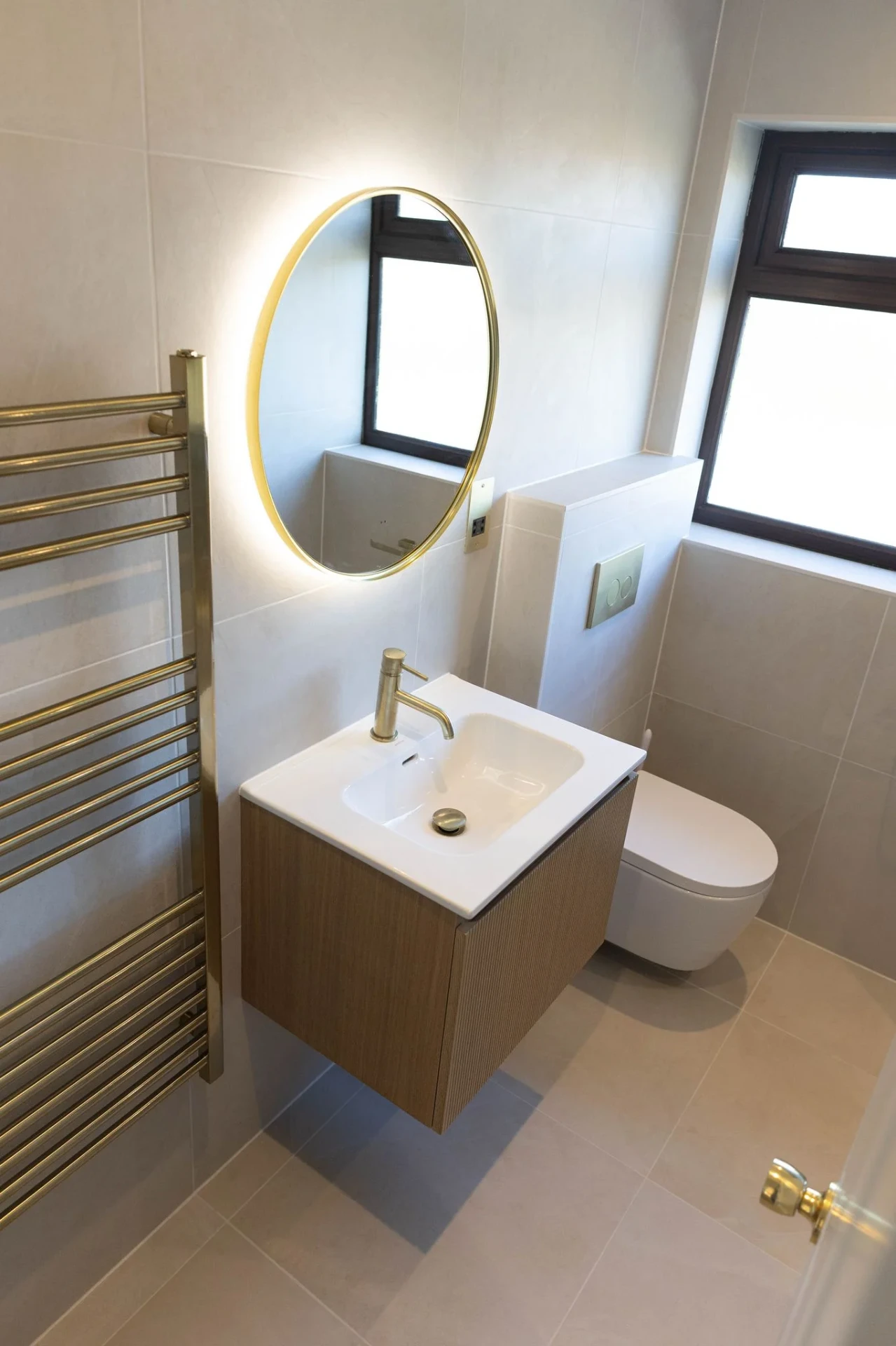 Full bathroom refit with brass fittings